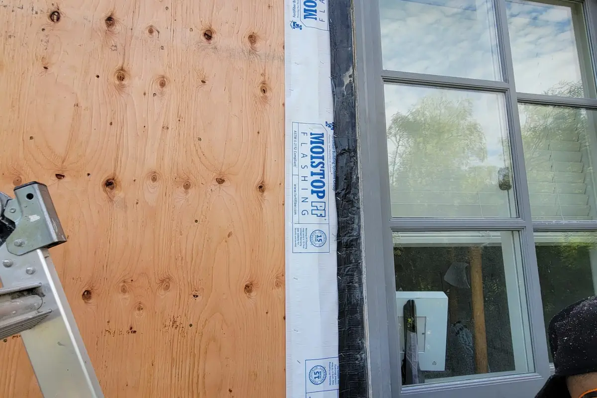Opened exterior wall and window waterproofing during Brentwood water intrusion repair